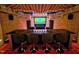 Incredible home theater with barstool seating to enjoy high-end visual and audio at 1820 Oatlands Court Ct, Wake Forest, NC 27587