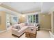 Comfortable seating area with natural light, neutral walls, recessed lighting, and stylish decor at 1820 Oatlands Court Ct, Wake Forest, NC 27587