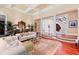 Elegant living room with coffered ceilings, hardwood floors, and refined furnishings, offering a luxurious and inviting atmosphere at 1820 Oatlands Court Ct, Wake Forest, NC 27587