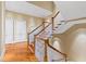 Elegant staircase with wood treads, white risers, and decorative railing at 1820 Oatlands Court Ct, Wake Forest, NC 27587