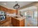 Kitchen with island, wood cabinets, and stainless steel appliances at 2674 Stanton Hill Rd, Cameron, NC 28326