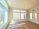 Spacious dining area with large windows for an abundance of natural light at 7621 Falls Creek Ln, Raleigh, NC 27614