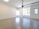 Spacious two-car garage with sealed floors, bright lighting, and multiple windows offering natural light at 7621 Falls Creek Ln, Raleigh, NC 27614