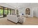Bright living room boasts a marble fireplace, custom shelving, and modern furnishings for comfortable living at 7621 Falls Creek Ln, Raleigh, NC 27614