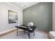 Well-decorated office space featuring large painting, ample lighting, and neutral tones at 7621 Falls Creek Ln, Raleigh, NC 27614