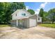 Two-story home featuring a brick base and a two car garage at 1844 Brier Ln, Graham, NC 27253