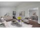 Open-concept living area with modern furnishings, stylish decor, and plenty of space for comfortable living at 1844 Brier Ln, Graham, NC 27253