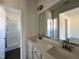 Double vanity bathroom with a large mirror and shower at 223 Waterwheel Dr, Selma, NC 27576