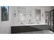 Elegant bathroom featuring double vanity sinks, stylish mirrors, marble countertops, and a view to the exterior at 2728 Trifle Ln, Wake Forest, NC 27587