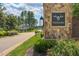 Neighborhood signage displaying 'Wexford', surrounded by lush landscaping and greenery at 2728 Trifle Ln, Wake Forest, NC 27587
