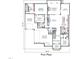 First floor plan showcasing the primary bedroom, kitchen, dining room, and two garages at 2728 Trifle Ln, Wake Forest, NC 27587