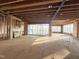 Open interior framing featuring a fireplace, large windows, and natural light at 2728 Trifle Ln, Wake Forest, NC 27587