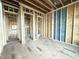 This living room is under construction and showcases the spacious layout and open doorways at 2728 Trifle Ln, Wake Forest, NC 27587