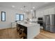 Modern kitchen with island and stainless steel appliances at 514 Edgecreek Ct, Raleigh, NC 27604