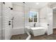 Spa-like bathroom with soaking tub and walk-in shower at 406 Terry Rd, Hillsborough, NC 27278