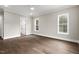 Bright bedroom with hardwood floors and en-suite bathroom at 406 Terry Rd, Hillsborough, NC 27278