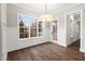 Bright breakfast nook with hardwood floors and access to back deck at 406 Terry Rd, Hillsborough, NC 27278