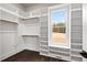 Spacious walk-in closet with ample shelving and hanging rods at 406 Terry Rd, Hillsborough, NC 27278