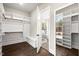 Large walk-in closet with built-in shelving and bench at 406 Terry Rd, Hillsborough, NC 27278