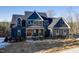 Gray farmhouse exterior, landscaping, and driveway at 406 Terry Rd, Hillsborough, NC 27278