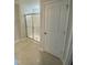 Bathroom showcasing a glass-enclosed shower and tiled flooring at 9249 Kitchin Farms Way # 432, Wake Forest, NC 27587