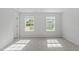 Bright bedroom featuring two large windows providing ample natural light at 9249 Kitchin Farms Way # 432, Wake Forest, NC 27587