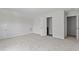 Carpeted bedroom space with doors to a closet and bathroom providing flexibility at 9249 Kitchin Farms Way # 432, Wake Forest, NC 27587