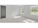 Sun-filled bedroom with large windows and neutral tones for a relaxing atmosphere at 9249 Kitchin Farms Way # 432, Wake Forest, NC 27587