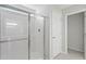 Bright bathroom featuring a sleek walk-in shower with sliding glass doors at 9249 Kitchin Farms Way # 432, Wake Forest, NC 27587
