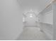 Spacious walk-in closet with ample shelving for clothing and storage at 7440 Summer Tanager Trl, Raleigh, NC 27614