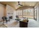 Cozy screened patio with stone fireplace and comfortable seating at 7440 Summer Tanager Trl, Raleigh, NC 27614