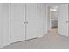 Spacious bedroom with closet and open doorway to ensuite bathroom at 543 Old Battle Bridge Rd, Wendell, NC 27591