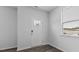 Bright entryway featuring a white door with sidelights and views to the front yard at 543 Old Battle Bridge Rd, Wendell, NC 27591