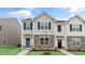 Attractive two-story home with stone accents and a well-maintained front lawn at 543 Old Battle Bridge Rd, Wendell, NC 27591