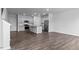 Spacious kitchen featuring stainless steel appliances, granite counters, and hardwood floors at 543 Old Battle Bridge Rd, Wendell, NC 27591