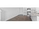 Bright kitchen featuring white cabinets, stainless steel appliances and granite countertops at 543 Old Battle Bridge Rd, Wendell, NC 27591