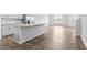 Open concept living space with a kitchen island and plenty of natural light at 543 Old Battle Bridge Rd, Wendell, NC 27591