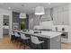 Spacious kitchen with large island, pendant lighting, and stainless steel appliances at 861 Wimbleton Dr, Raleigh, NC 27609