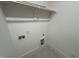 Practical laundry room area with white walls at 861 Wimbleton Dr, Raleigh, NC 27609