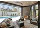 Inviting outdoor living space with a fireplace, comfortable seating, and a view of the pool at 861 Wimbleton Dr, Raleigh, NC 27609
