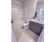 Well-lit bathroom showcasing a shower-tub combo and modern vanity at 457 Duncan Creek Rd # 141, Lillington, NC 27546