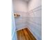 This pantry features an abundance of metal shelving and wood-look flooring at 457 Duncan Creek Rd # 141, Lillington, NC 27546