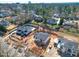 New construction aerial view of a property showcasing the neighborhood and ongoing development at 865 Wimbleton Dr, Raleigh, NC 27609