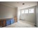 Bathroom area with tiled walls, a modern shower, and a built-in bench at 865 Wimbleton Dr, Raleigh, NC 27609