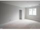 Room with natural light streaming from the window, freshly painted walls, and neutral floors at 865 Wimbleton Dr, Raleigh, NC 27609