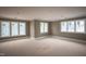 Spacious bonus room offering lots of natural light with multiple windows overlooking the property at 865 Wimbleton Dr, Raleigh, NC 27609