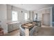 This expansive kitchen features custom cabinets, a large window, and an eat-in breakfast area at 865 Wimbleton Dr, Raleigh, NC 27609