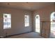 Unfinished living room featuring large windows and natural light at 865 Wimbleton Dr, Raleigh, NC 27609