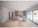 This living room has built-in shelving, a fireplace, and an oversized glass slider to the back yard at 865 Wimbleton Dr, Raleigh, NC 27609