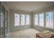 This spacious living room with many windows is filled with natural light at 865 Wimbleton Dr, Raleigh, NC 27609